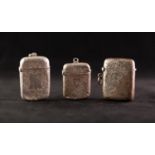 THREE VARIOUS VESTA BOXES, each oblong and hollowed and with vine leaf or flowerhead engraved