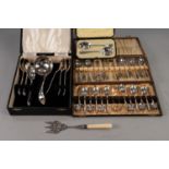 A CASED SET OF SIX E.P. SOUP SPOONS, WITH LASDLE, ALSO A CASED PAIR OF PLATED FRUIT SPOONS, an