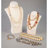 A SIMULATED PEARL NECKLACE, A CARVED BEAD NECKLACE, A BOX LINK BRACELET, A CIRCULAR LOCKET