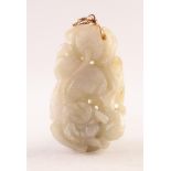 CHINESE CARVED AND PIERCED 'MUTTON FAT' JADE LARGE PENDANT