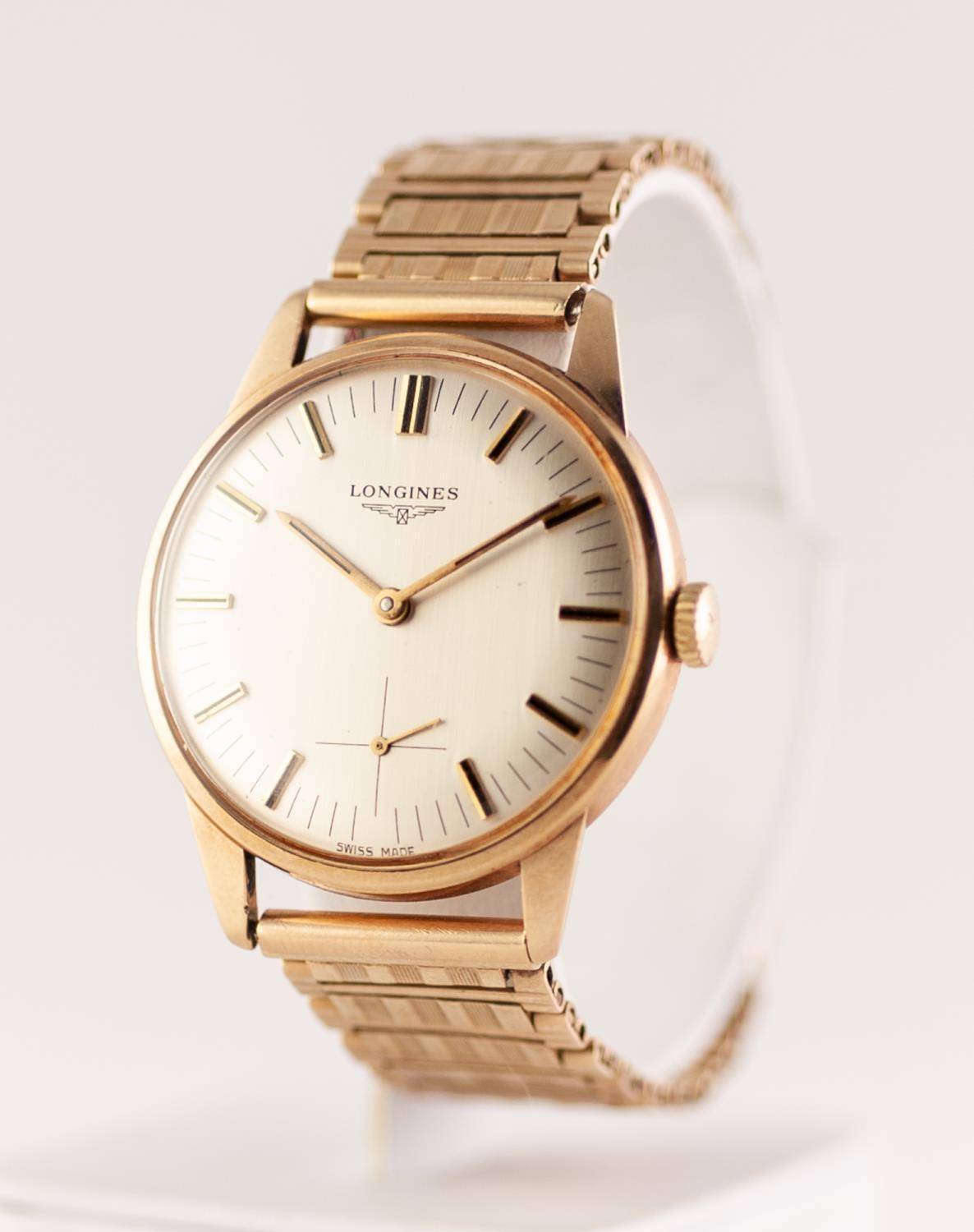 GENTS LONGINES GOLD (indirectly marked) WRIST WATCH with mechanical movement. circular silver dial