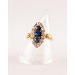 VICTORIAN 18ct GOLD SAPPHIRE AND DIAMOND NAVETTE RING, a central oval sapphire flanked by two off-