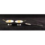 PAIR MID 20th century SILVER AND ENAMELLED CIRCULAR OPEN SALTS AND SPOONS yellow interior to the