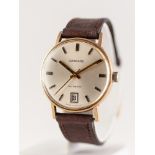 GENTS GARRARD GOLD WRIST WATCH with Swiss automatic movement, circular silvered dial with batons