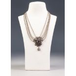 SILVER BAROQUE NECKLACE, the large silver open work two part clasp linked by four silver belcher