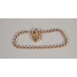 9ct GOLD CURB LINK BRACELET, with padlock clasp, length 18cm, 10.59g