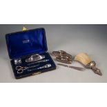 COMPOSITE SILVER MANICURE SET having four matching pieces including nail buffer and silver lidded