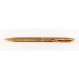 18ct GOLD AND DIAMOND BALL POINT PEN, with textured barrel and diamond set clip, total estimated