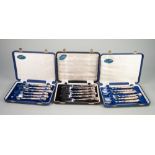 THREE CASED MATCHING SETS OF CAKE FORKS WITH QUEENS PATTERN FILLED SILVER HANDLES, Sheffield