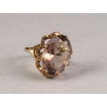 9ct GOLD DRESS RING, with large oval smoky quartz in a fancy eight claw crown setting, 4.6gms,