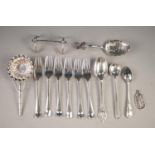 A SET OF SILVER CAKE FORKS, Sheffield 1931, a silver PRESERVES SPOON, and an ODD SILVER TEASPOON, an