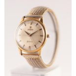 GENT'S OMEGA, GENEVE, GOLD PLATED WRIST WATCH with automatic movement, silvered round dial with