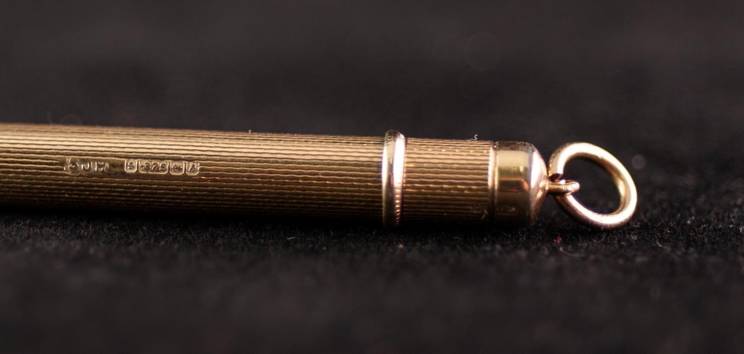 POST WAR 9ct GOLD CASED PROPELLING PENCIL with engine turned decoration and suspension ring, maker - Image 3 of 3