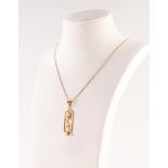 18K GOLD FINE CHAIN NECKLACE and the Egyptian GOLD COLOURED METAL PENDANT, 4.9gms in total