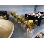 FIVE, CIRCA 1920S, FRUIT BOWLS, THE CLEAR GLASS BASES WITH BUBBLE DETAIL AND YELLOW GLASS BOWLS