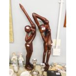 A PAIR OF AFRICAN WOODEN CARVED SCULPTURES, TWO FEMALE FIGURES, POSED IN ABSTRACT (2)