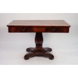 EARLY NINETEENTH CENTURY BIEDERMEIER FLAME CUT MAHOGANY PEDESTAL SIDE/ WRITING TABLE, the quarter