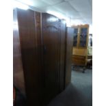 1950's CARVED OAK SINGLE DOOR HANG WARDROBE, AND A CHEST OF FIVE LONG DRAWERS