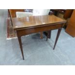 MAHOGANY OBLONG TEA TABLE WITH SWIVEL AND FLAP TOP, ON FOUR SQUARE TAPERING LEGS