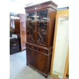 MAHOGANY REPRODUCTION DISPLAY CABINET, THE BASE HAVING TWO DRAWERS ABOVE TWO CUPBOARD DOORS AND
