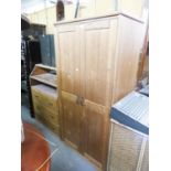 CHILD'S PINE TWO DOOR WARDROBE AND A PINE BABY STATION WITH FOLD OUT TOP FORMING A BABY CHANGING