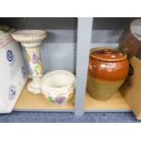 A FRUIT VINE EMBOSSED POTTERY JARDINIERE ON PEDESTAL STAND AND A LARGE BROWN EARTHENWARE POT WITH
