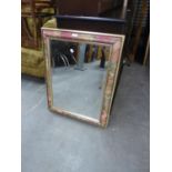 A MODERN FLORAL BORDERED BEVELLED EDGE WALL MIRROR