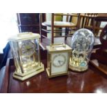 METAMEC CARRIAGE STYLE MANTEL CLOCK, HEAVY GILT METAL CASE HOUSING A BATTERY POWERED MOVEMENT,