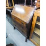 A MAHOGANY BUREAU WITH BOX WOOD LINE INLAY, SLOPING FALL- FRONT, THREE LONG DRAWERS BELOW, ON FOUR