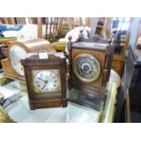 LATE 19TH CENTURY WALNUT WOOD CASED MANTEL CLOCK WITH DRUM SHAPED MOVEMENT STRIKING ON A BELL THE