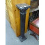 A BLACK MARBLE COLUMN PEDESTAL WITH SQUARE TOP AND BASE, 3' 3" HIGH