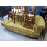 AN EARLY 20TH CENTURY UPHOLSTERED DOUBLE DROP-END SOFA