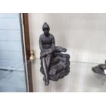 MODERN BRONZED COMPOSITION FIGURE OF A FISHERMAN SAT NEXT TO AN OPEN BASKET OF FISH, 8 ¼? high