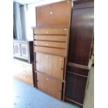 MID 20TH CENTURY WALL HANGING TEAK SHELVING, CUPBOARDS AND A CHEST OF FOUR DRAWER, ANOTHER WITH