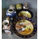 NORITAKE CHINA TAZZA PAINTED WITH A DESERT SCENE, CAMEL RIDER AND OASIS, RICH MIDNIGHT BLUE AND GILT