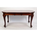 LATE VICTORIAN MAHOGANY WIND-OUT EXTENDING DINING TABLE WITH TWO ADDITIONAL LEAVES, the ?D? ended