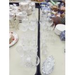 GROUP OF CUT GLASS ITEMS TO INCLUDE THREE DECANTERS, WINE GLASSES, SHERRY GLASSES, A FRUIT BASKET,