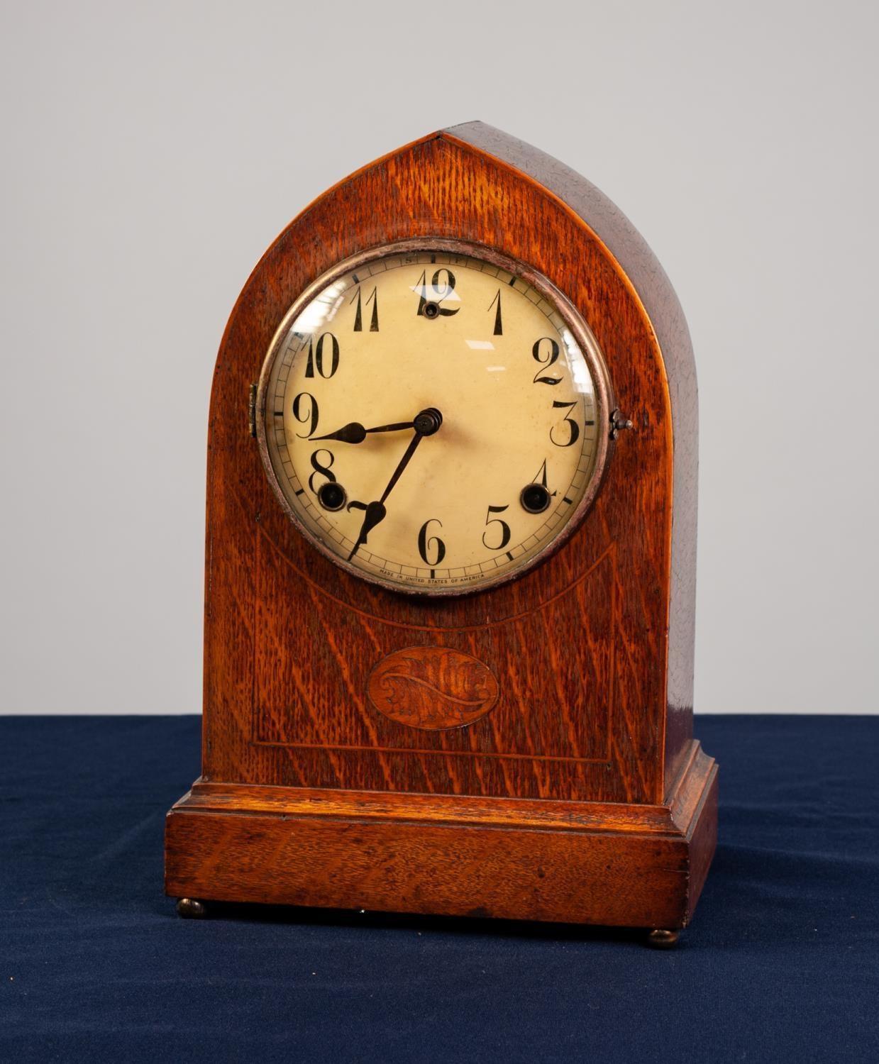 EARLY TWENTIETH CENTURY INLAID OAK LANCET TOP MANTLE CLOCK, the 5 ¼? Arabic dial powered by a