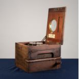 INTER-WAR YEARS WOODEN CASED TIME RECORDING CLOCK WITH CIRCULAR SILVERED DIAL