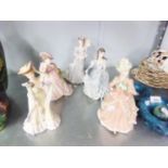 FOUR WEDGWOOD LADY FIGURINES AND A COALPORT EXAMPLE