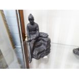 MODERN BRONZED COMPOSITION FIGURE OF A FISHERMAN SAT NEXT TO AN OPEN BASKET OF FISH, 8 ¼? high
