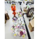 COLLECTION OF PORCELAIN FLOWER POSIES AND A MURANO GLASS CLOWN