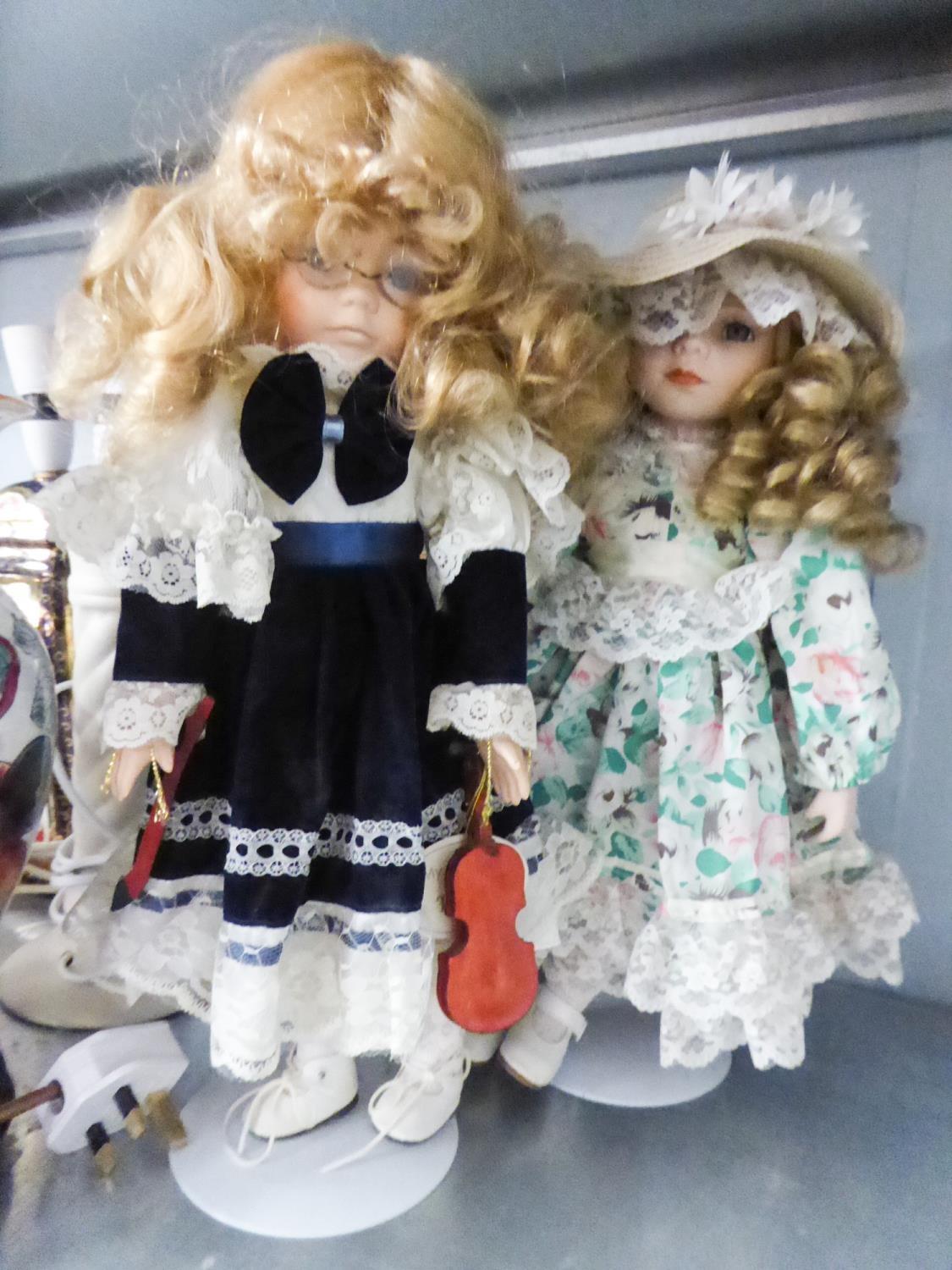 FOUR MODERN STANDING DOLLS, WITH PORCELAIN HEADS AND HANDS, IN ATTRACTIVE ATTIRE - Image 2 of 2