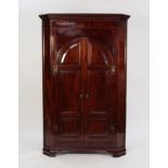 GEORGE III MAHOGANY CORNER CUPBOARD, the moulded cornice above a line inlaid frieze and pair an