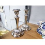 A PAIR OF ELECTROPLATE CANDLESTICK STANDS (2)
