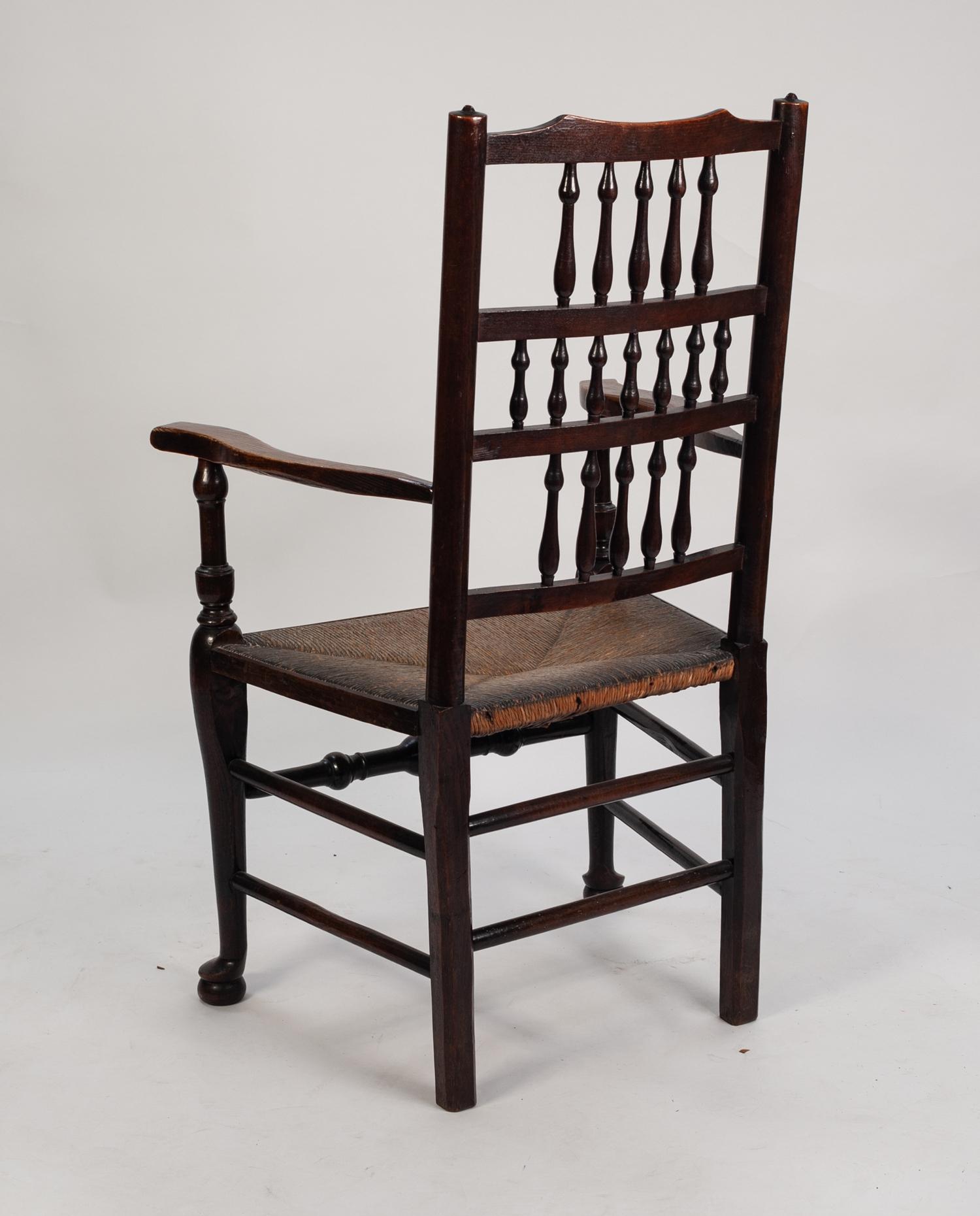 NINETEENTH CENTURY ELM AND FRUITWOOD SPINDLE BACK OPEN ARMCHAIR, the back with seventeen spindles in - Image 2 of 2