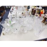 A GROUP OF CUT GLASS ITEMS TO INCLUDE BASKETS, VASES, ANIMAL FIGURES, BELL ETC
