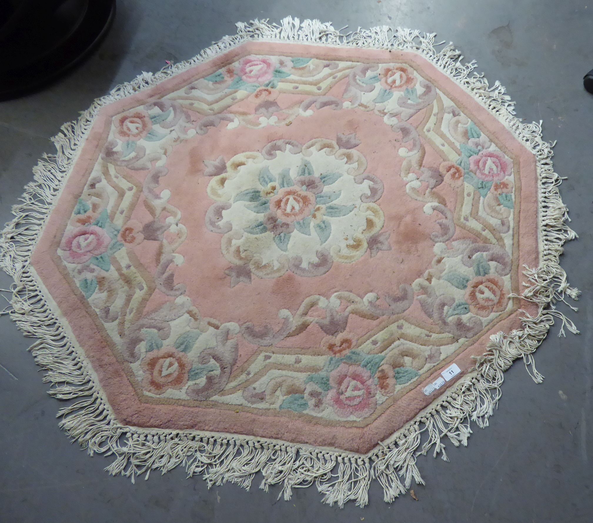 AN OCTAGONAL CHINESE RUG, PINK GROUND, OF AUBUSSON FLORAL DESIGN