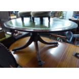 A MAHOGANY OVAL COFFEE TABLE AND A SMALL SOFA TABLE STYLE OCCASIONAL TABLE WITH FALL LEAVES