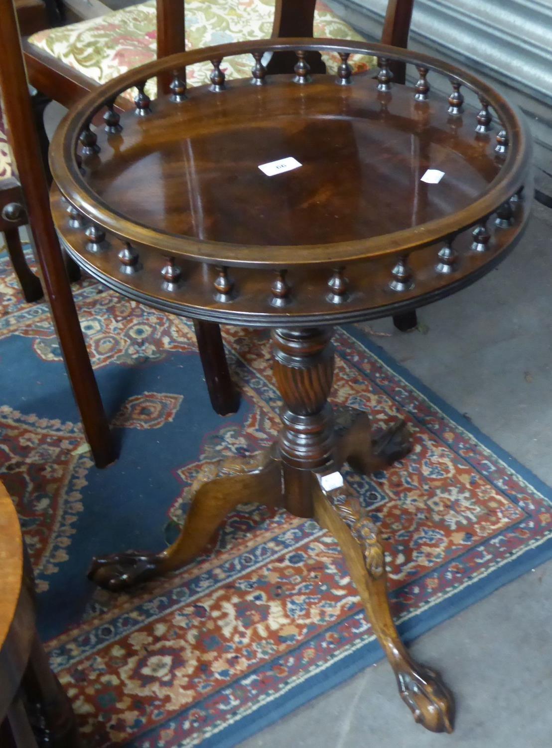 A MODERN REPRODUCTION TRIPOD WINE TABLE, WITH GALLERY TOP